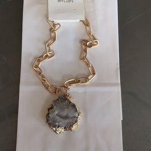 
            
                Load image into Gallery viewer, Gold marble necklace
            
        