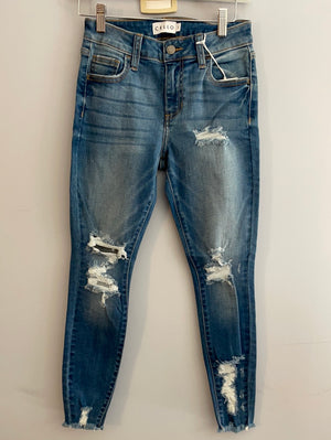 Mid Rise Frayed Hem Skinny Jeans