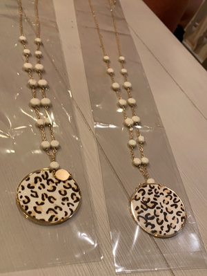 
            
                Load image into Gallery viewer, Long Faux Animal Print Necklace
            
        